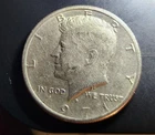 1971 D KENNEDY HALF DOLLAR WITH DD ON UNITED, HALF DOLLAR AND A DIE CHIP