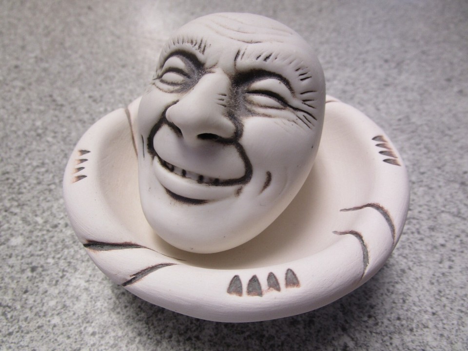 NOS 90s mortar & pestle shaped like a creepy human head — functional kitchenware that doubles as a freaky conversation starter.