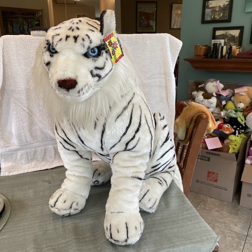 stuffed white tiger with blue eyes