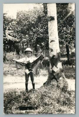 Pith-Helmet Boy w Flying Fox Bat RPPC Singapore Antique Photo Postcard~1930s