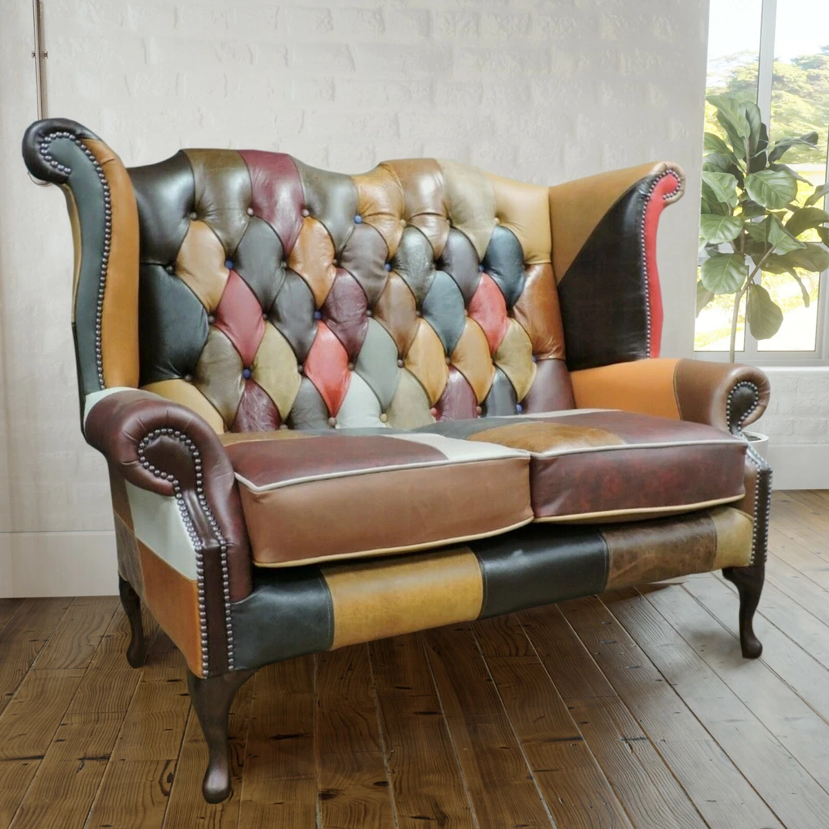 Harlequin leather online chesterfield sofa