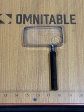 vintage handheld rectangular magnifying glass