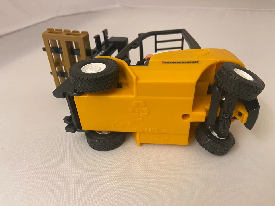 CONRAD JUNGHEINRICH FORKLIFT TOY WITH DRIVER FIGURINE RARE COLLECTIBLE PLASTIC - Image 4 of 4