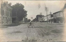 SW Paw Paw MI RPPC BICYCLE AT MASONIC BLOCK & TRUE NORTHERNER Newspaper Office