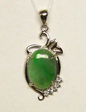 Light green genuine jadeite jade pendant .925 Silver, medium color, translucency