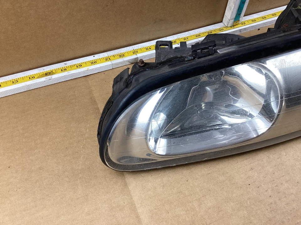 Левая передняя фара в сборе со стороны водителя для Oldsmobile Aurora 2001-2003 годов выпуска от оригинального производителя - Изображение 3 из 4