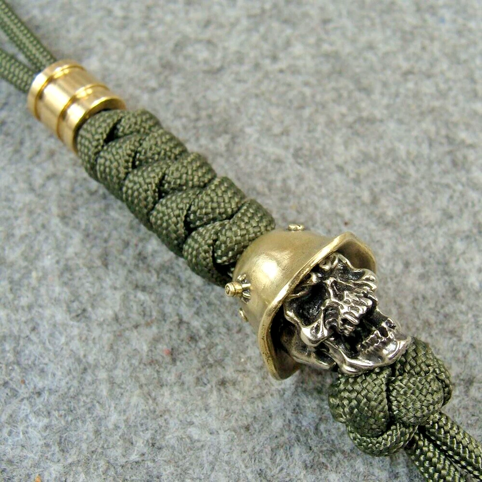 Cordón de cuchillo Paracord 550 hecho a mano con cuentas de latón y cuentas de calavera de cobre blanco Foto 4 de 4