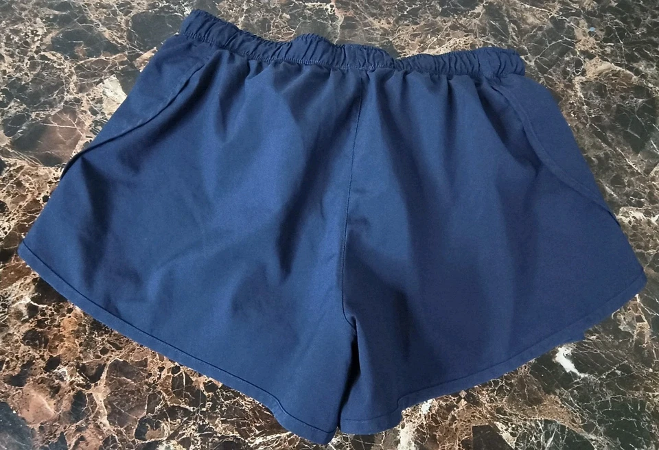 Pantalones Cortos de Correr New Balance Impact Para Mujer Medianos Atléticos 2 en 1 Azul Foto 3 de 4