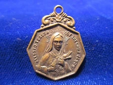 St Therese Medal Octagonal "Spend My Heaven Doing Good on Earth" Brass w/ Patina