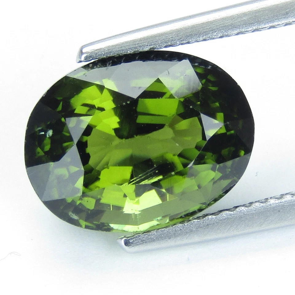 Подлинный удивительный натуральный зеленый турмалин овальной формы 6,16 карата 12,2x9,4 мм - Изображение 3 из 4