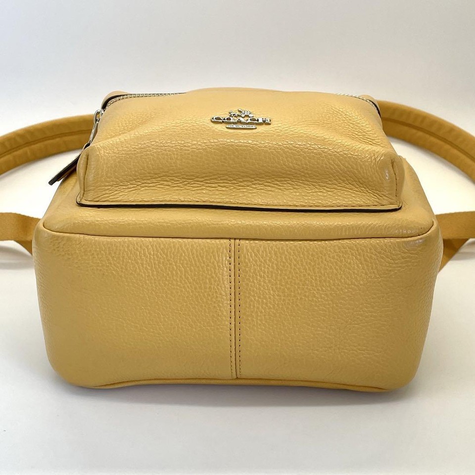 COACH All Leather Mini Backpack Yellow Mustard color that is easy to