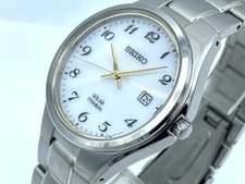 SEIKO Solar Titanium Men's Watch White Dial Weighs 2.8 oz 100mW/R V157-0BC0