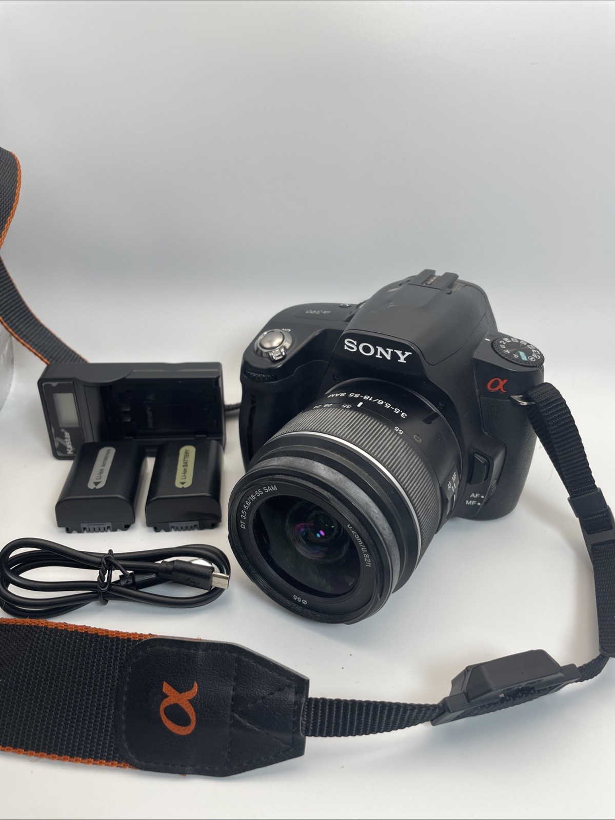 Sony Alpha DSLR-A390 14.2MP Camera with 18-55mm Zoom Lens 3 Batteries & Charger