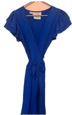 This is a vintage "Miss O" by Oscar de la Renta . It features a "Lord & Taylor"