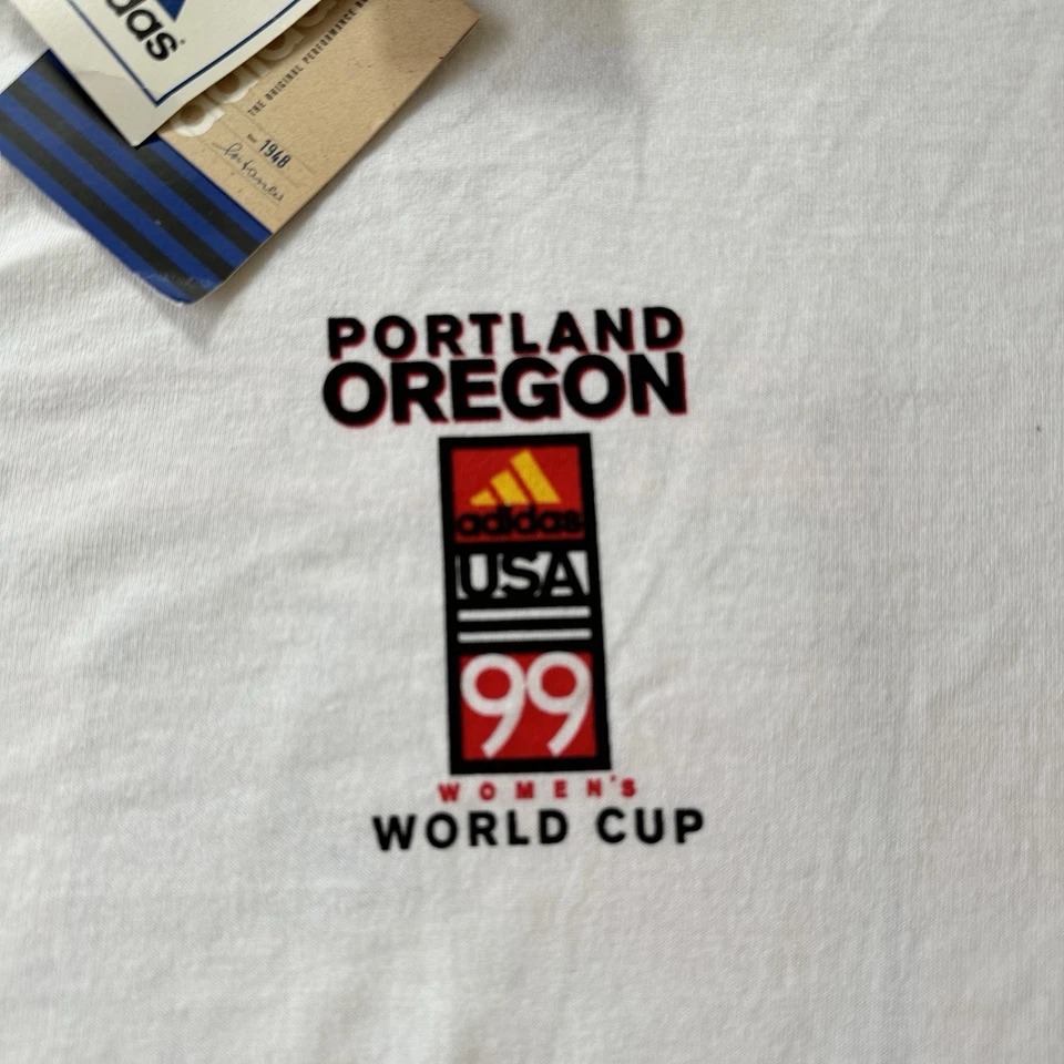 CAMISETA VINTAGE DE LA COPA MUNDIAL FEMENINA Portland 1999 FIFA NUEVA CON ETIQUETAS NUEVA Rara USA Chastain Foto 2 de 4
