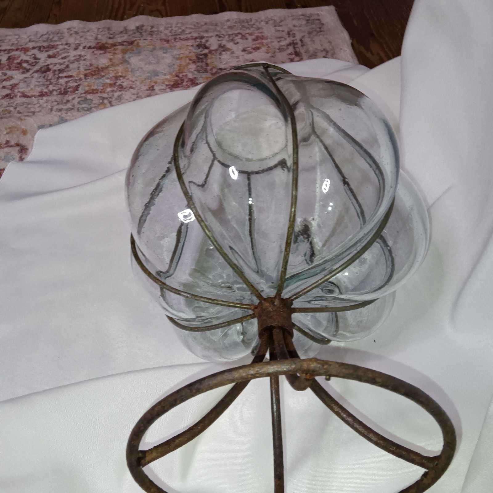 Antique Caged Glass Vase with a Wrought Iron Base.  Hand Blown Candle Holder