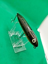 Heddon , top water  Original Zara spook in a frog green/yell.