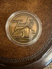 TAUCK TRAVEL 100 YEARS  COIN - 1  3/4" Diameter — photo 1