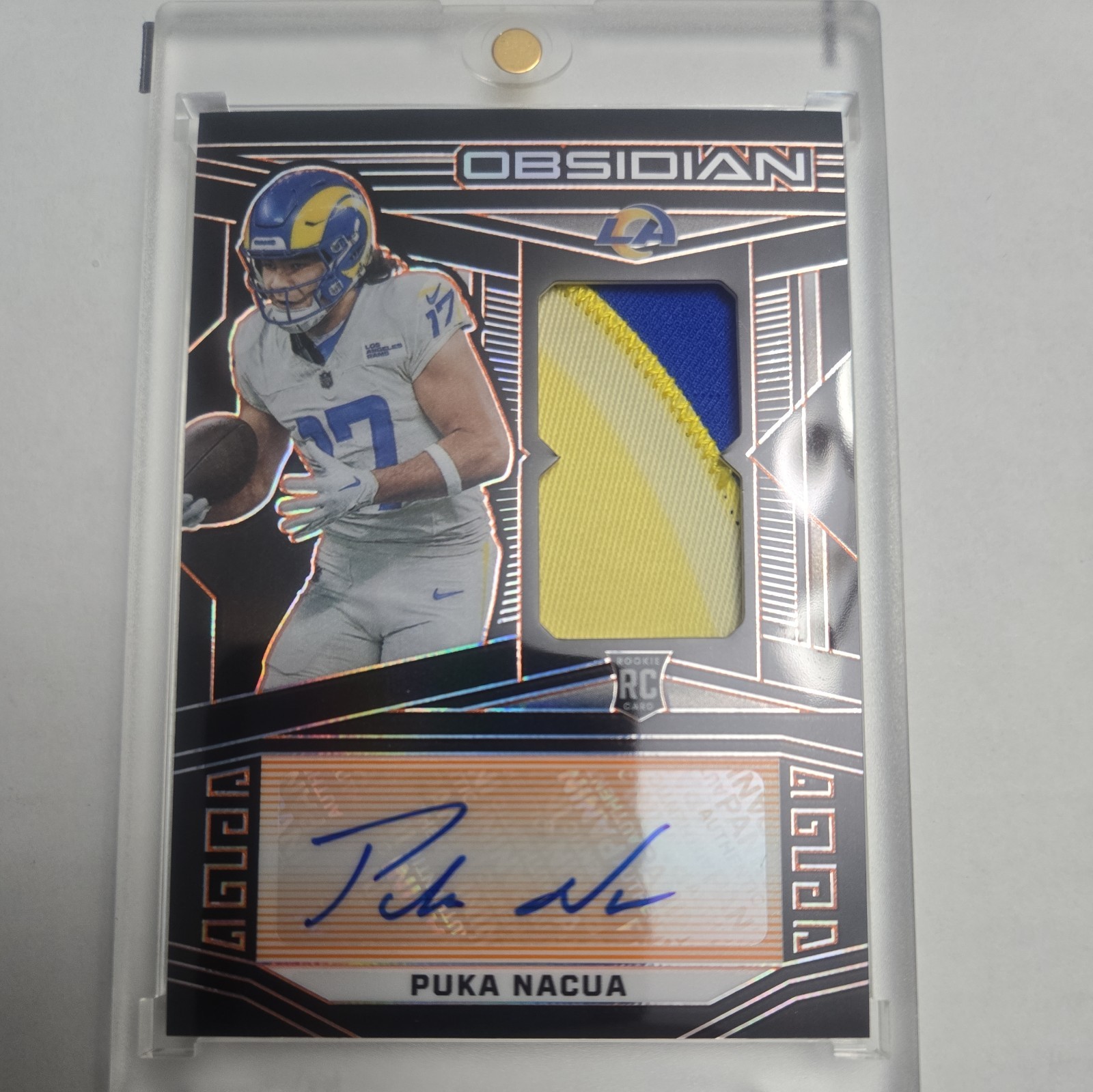 2023 PANINI OBSIDIAN PUKA NACUA ROOKIE AUTO JERSEY RPA ORANGE /49 RAMS PSA 9