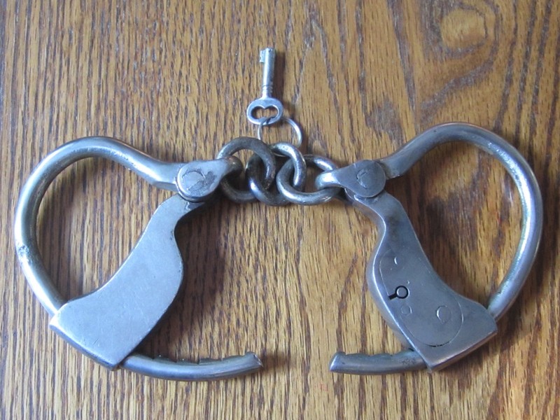 VINTAGE UNMARKED HANDCUFFS, W/ KEY  (I think they are Towers double lock cuffs)