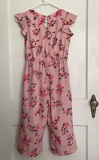 Japna Kids Chic pink jumpsuit with a vibrant floral pattern. Perfect for Spring