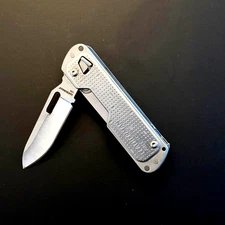 Leatherman FREE T4 Silver Multi-Tool  Unused No Box Excellent Condition