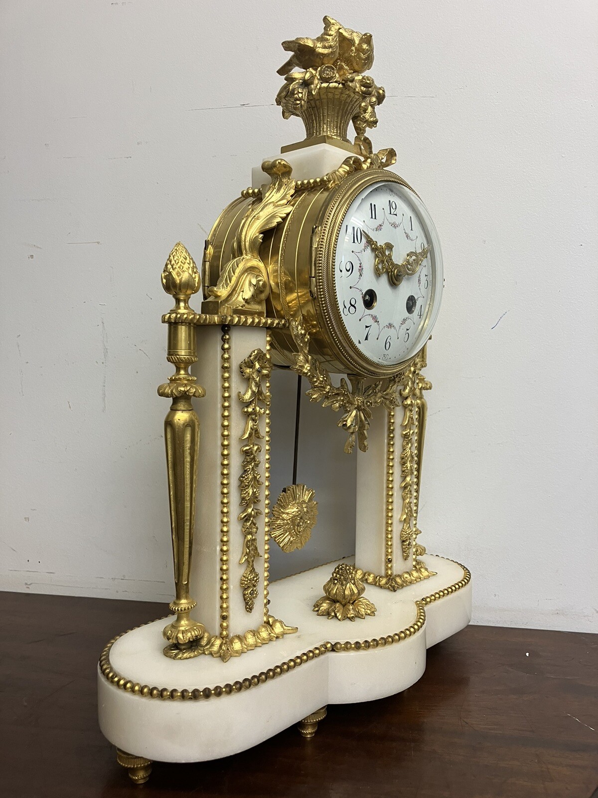 Antique French Mantel Clock With Gilt Mounts On White Marble Base and