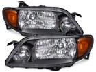 Headlights Halogen Pair Set Fits 2001-2003 Mazda Protege 4Dr Only W/Metal Bezel (For: Mazda Protege)