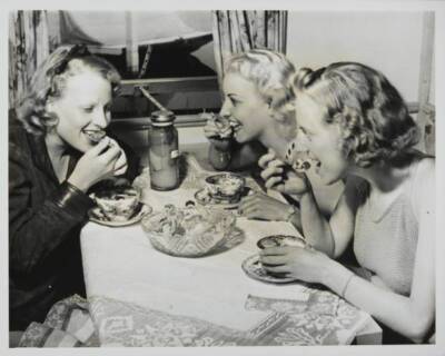 Three sweets Three young women enjoying pudding in their carava- 1937 Old Photo