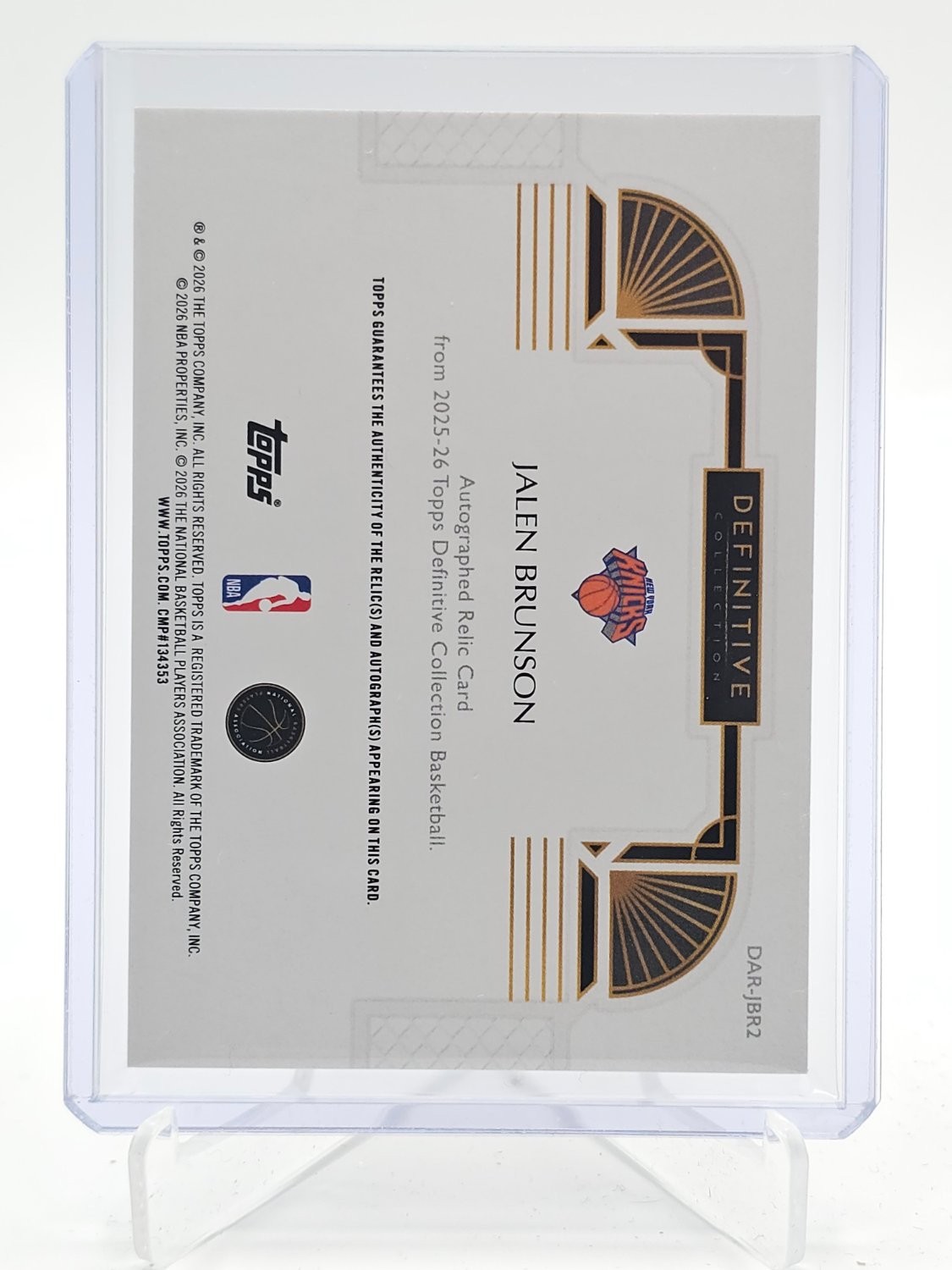 JALEN BRUNSON 2025-26 TOPPS DEFINITIVE GAME-USED PATCH ORANGE AUTO /25 Q6563 view 2