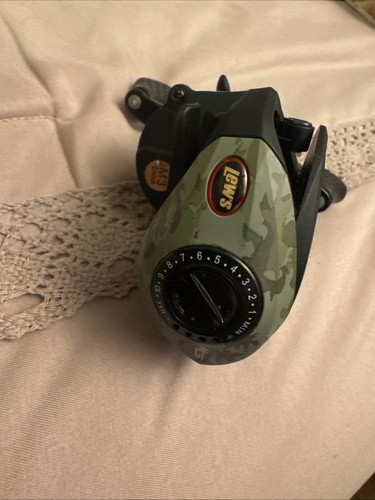 LEWS CAMO BAITCAST AMERICAN HERO FISHING REEL 7.5:1 AHC1SHG2 Right Hand - Picture 3 of 5