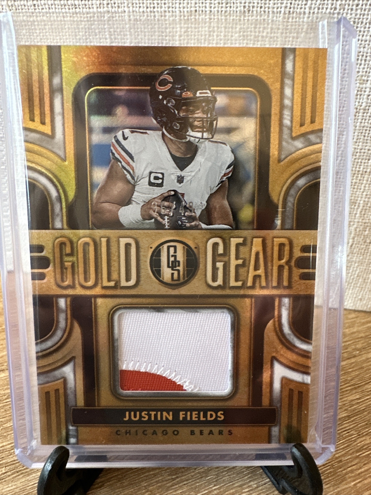 2023 Panini Gold Standard Justin Fields Gold Gear White Gold /49 MEM Card