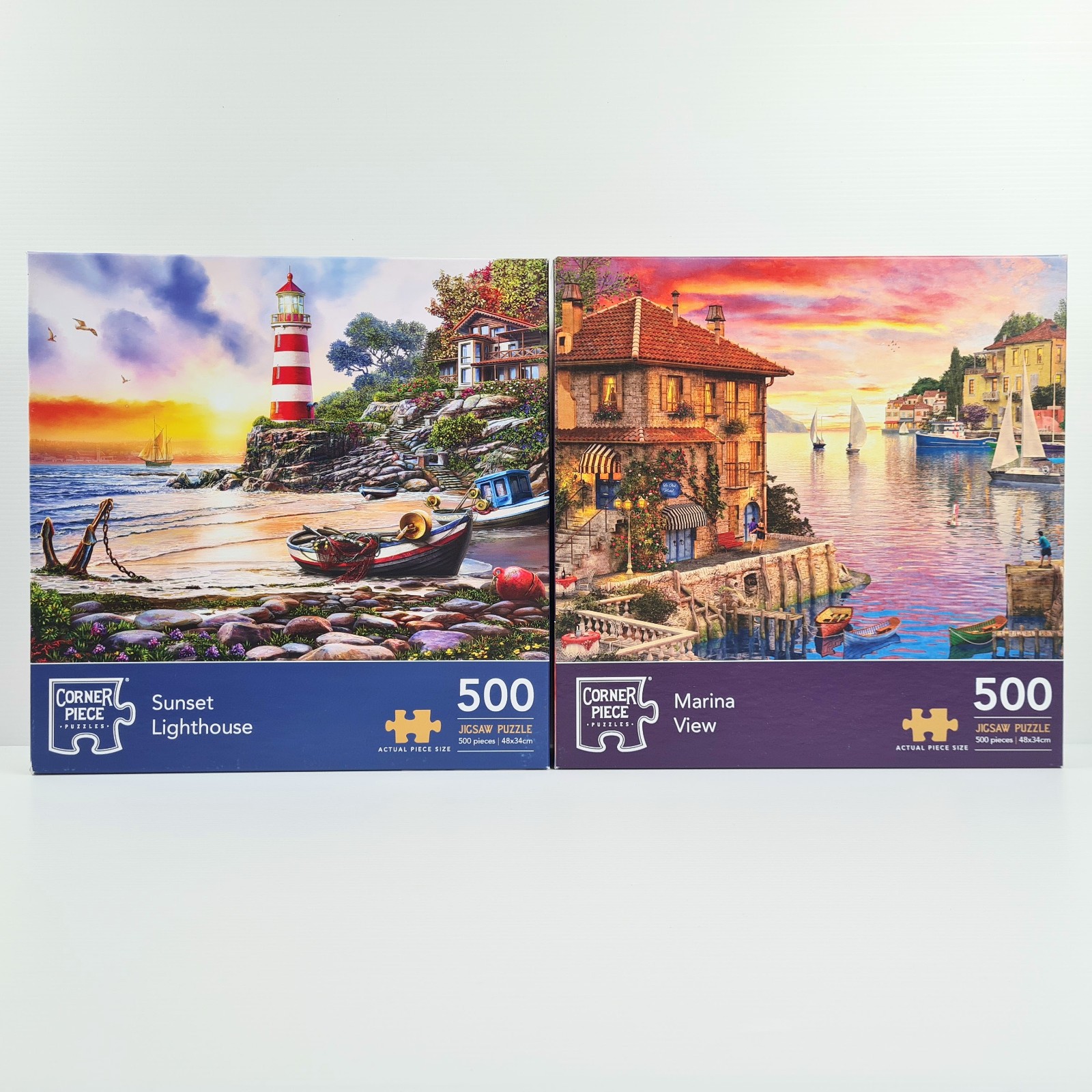2 x 500 pc Puzzles Sunset Lighthouse (Complete) Marina View (1 pc missing) Boats