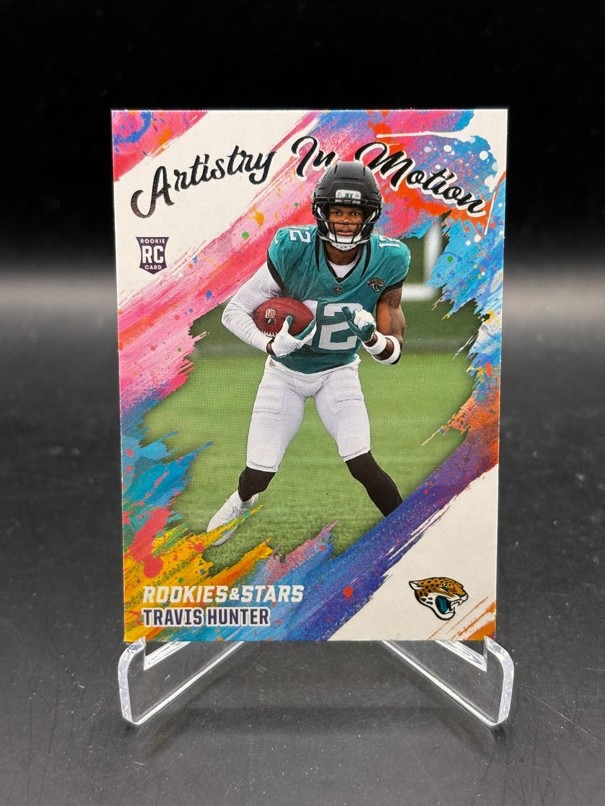 2025 Panini Rookies & Stars - Travis Hunter Artistry In Motion #8 (RC)