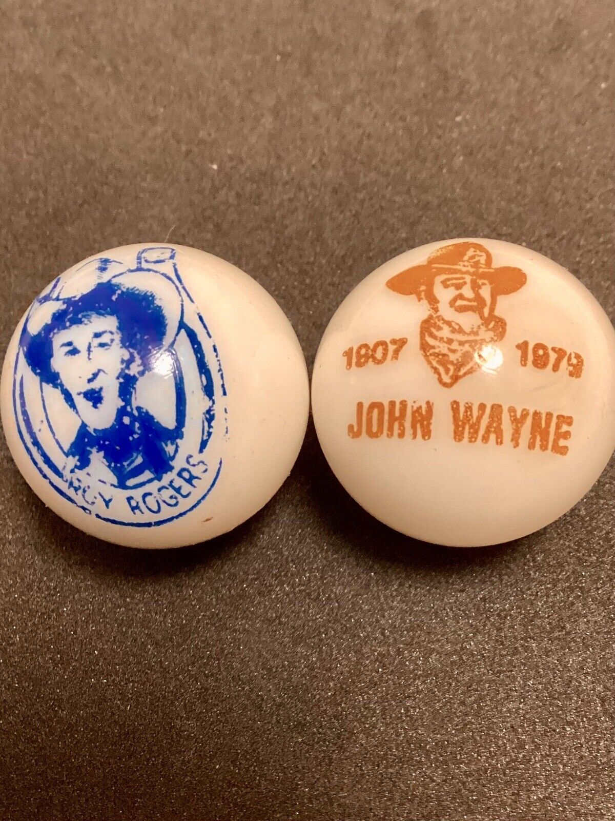 Two mint character marbles, John Wayne, Roy Rogers, 0.98”
