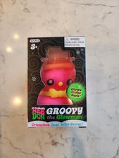 Muñeco de nieve NeeDoh Nee Doh Groovy the Glowman Squishmas Crunch Snow ROSA Schylling