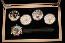2015  RCM, Looney Toons Watch & 4-$20 Silver Coin Set.  