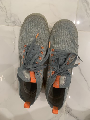 grey and orange vapormax flyknit