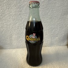 8 OZ COCA COLA COMMEMORATIVE BOTTLE- 1998 QUINCY'S 25 YEARS