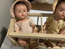 Dolls Composition Dionne Quints 1937 with wooden tricycle