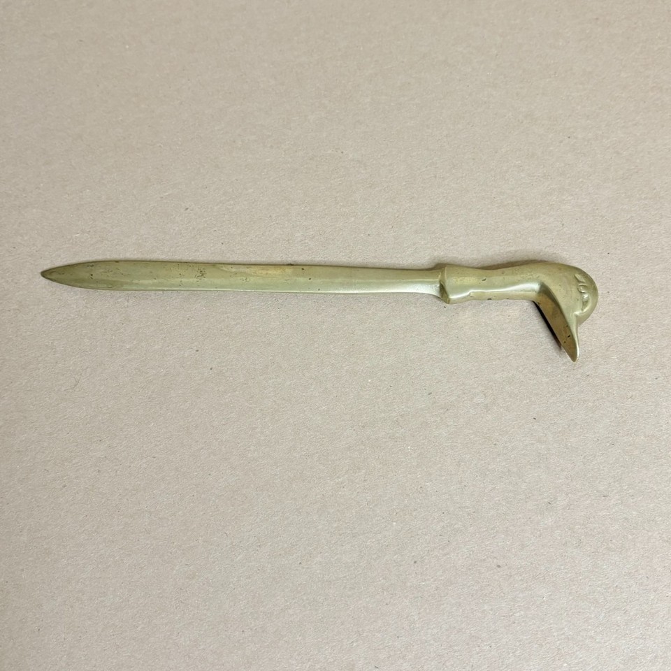 A solid brass duck-head letter opener that doubles as a miniature sculpture — functional, quirky, and undeniably conversation-starting on any desk.