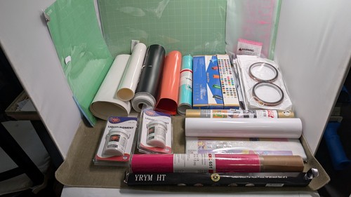 Lot of craft supplies collection of vinyl cutting, heat pressing, and resin cast