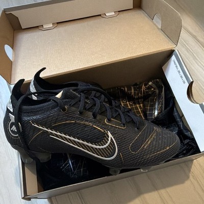 Nike Mercurial Vapor 14 Elite FG soccer cleats in a Black and Metallic Gold