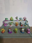 Disney Doorables Series 15 In Full Bloom figure lot. 2 ultra rare and 5 rare