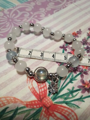 Armband aus Glasperlen, mit Stern und kleinen Opalfarbenden Glas