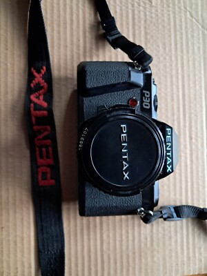 camera. Pentax P30 SLR  35mm with Pentax 50mm and Sigma 28 - 70mm zoom lens .