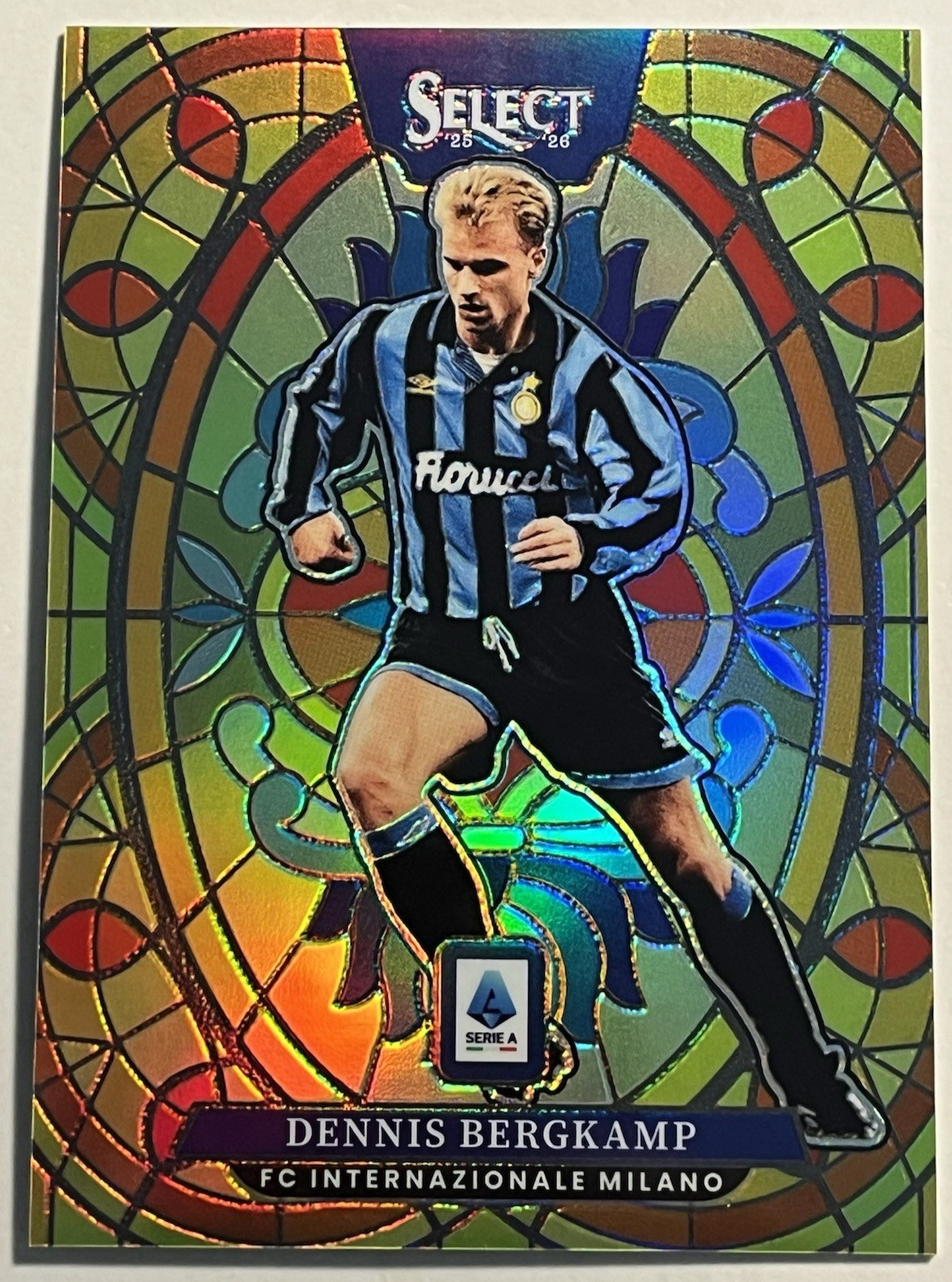 Dennis Bergkamp #4 Soccer Cards 2025 Panini Select Serie A Stained Glass trading card — raw and PSA graded price guide
