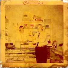 1953 Kodacolor Photograph Two Men in General Store Market Interior Mid Century