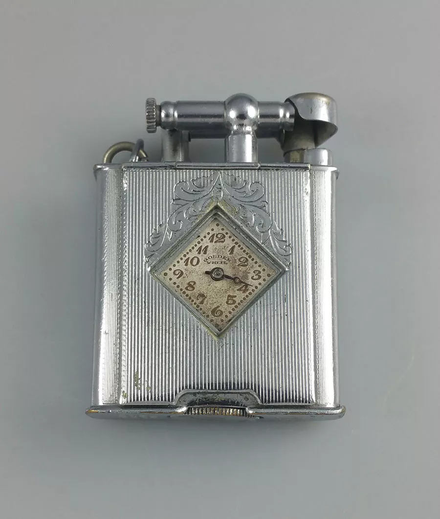 VINTAGE GOLDEN WHEEL LIFT ARM WATCH LIGHTER - ART DECO - 1930'