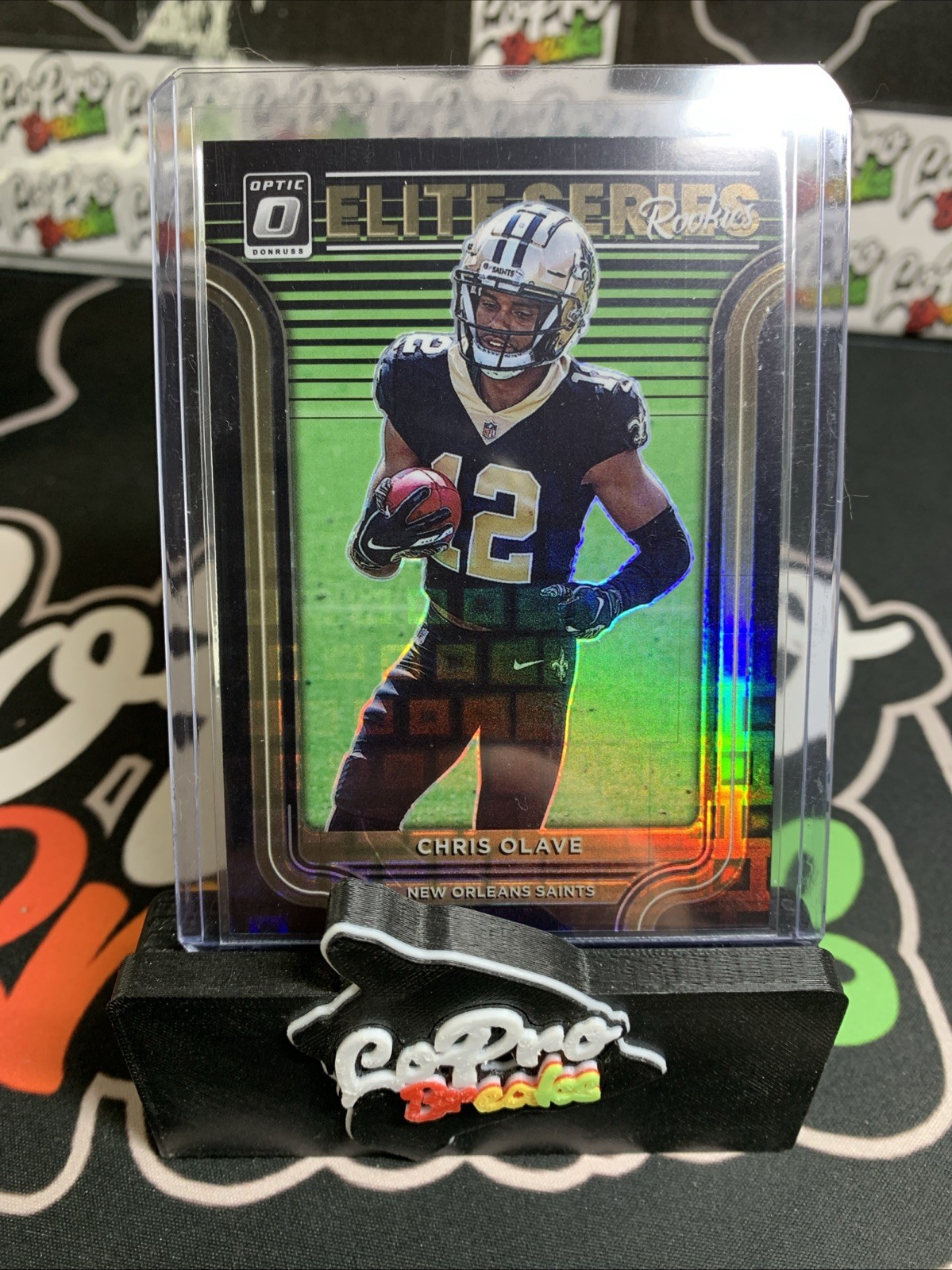 2022 Optic Chris Olave Rookie Elite Series Rookies Black Pandora Jersey 12/25 RC